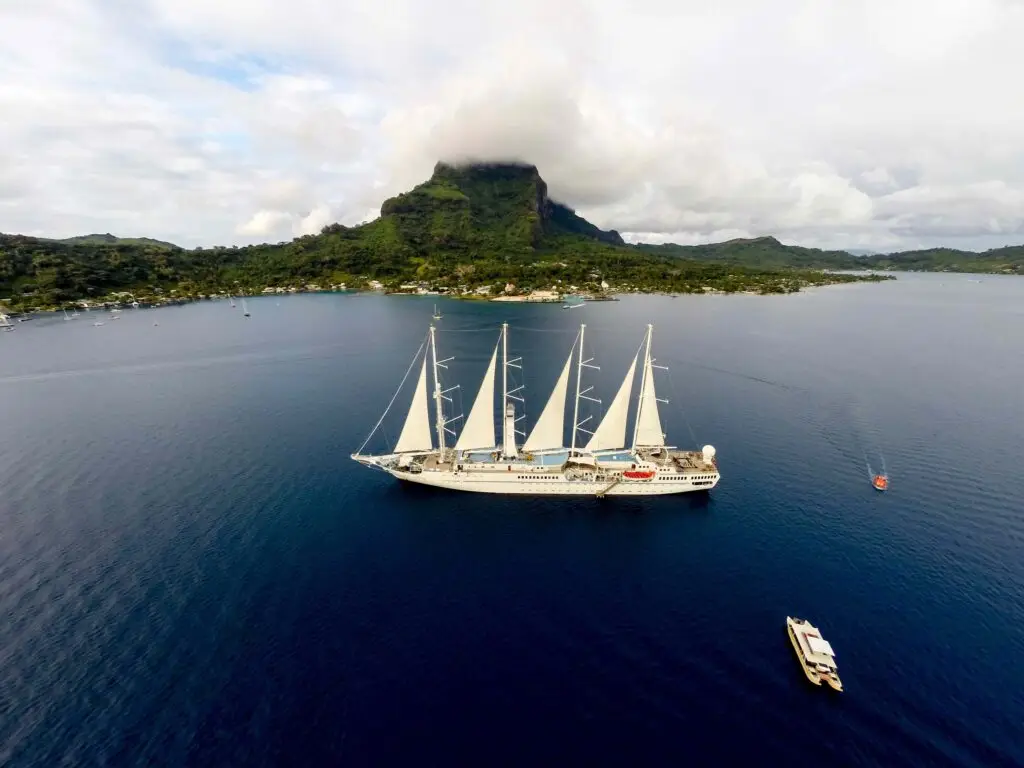 The Wind Surf, Windstar Cruises' iconic sailing yacht, cruising the Atlantic ahead of the Adventures for Solo Travelers November 2027 voyage through the Canary Islands and Madeira.
